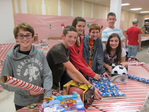 In 2013, the Folks Middle School National Junior Honor Society held its first annual wrapping party to help out local charity Elf Louise. Members met at the Elf Louise facility after school and stayed for two hours wrapping gifts for over 15 families.